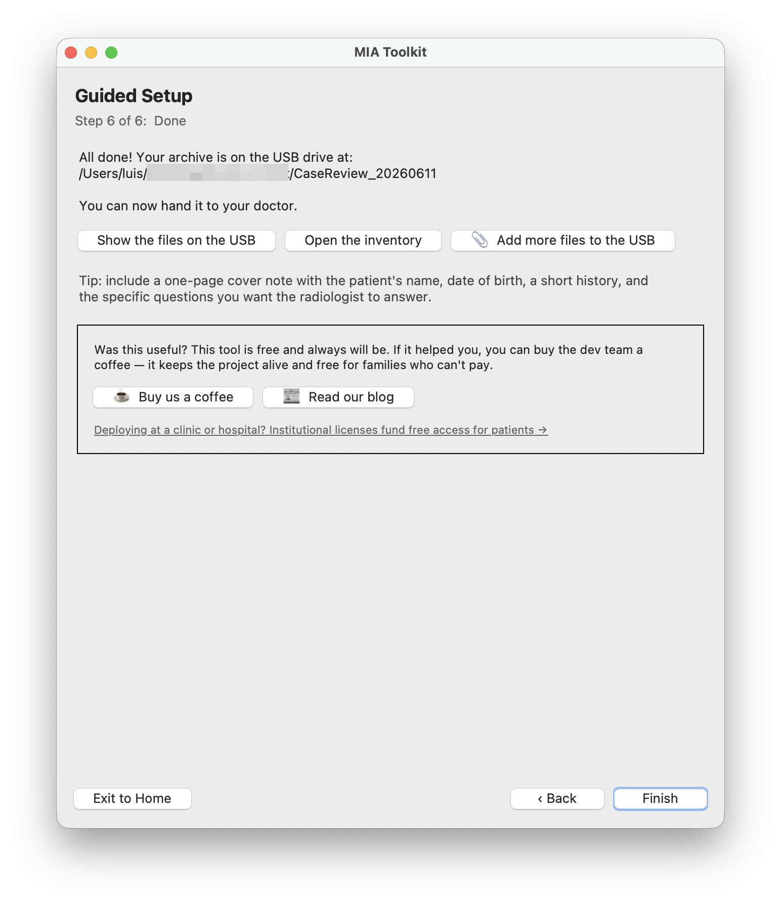 The Done screen confirming the archive was delivered to the USB.